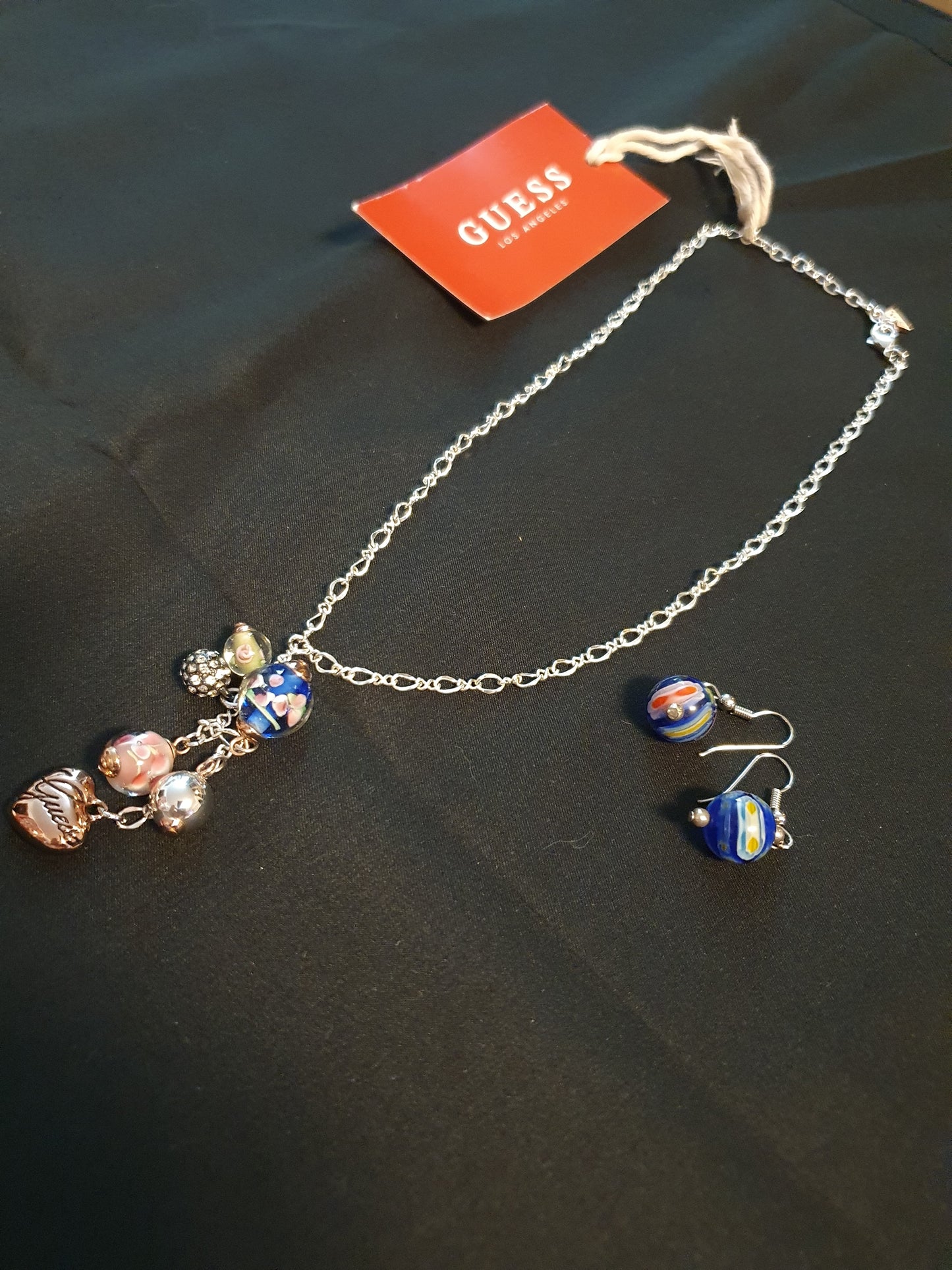 Collana e orecchini Guess