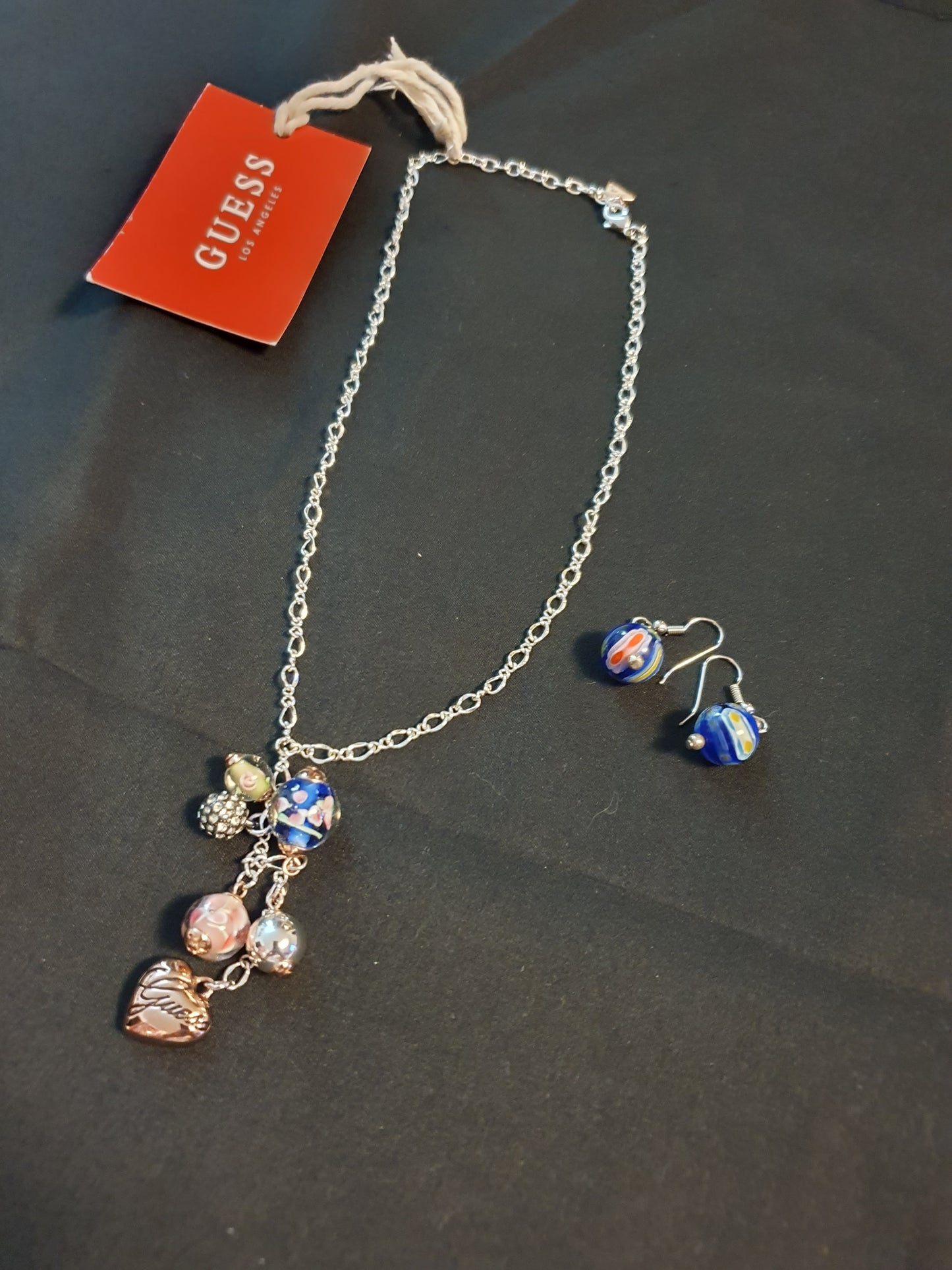Collana e orecchini Guess