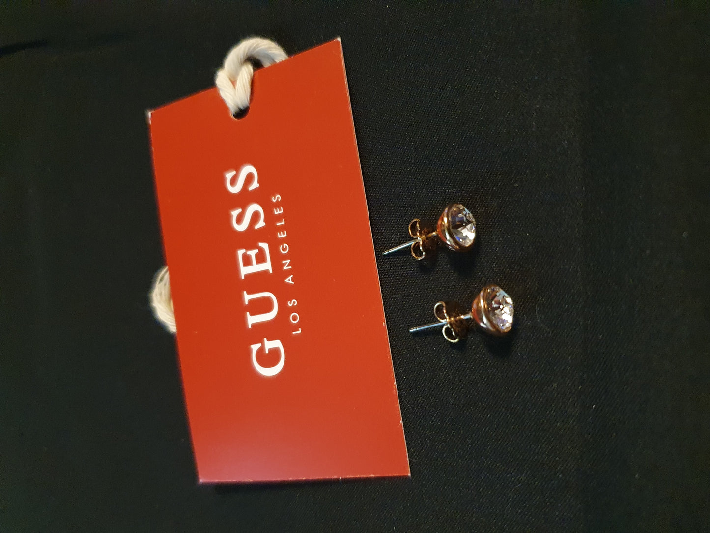 Orecchini Guess punto luce