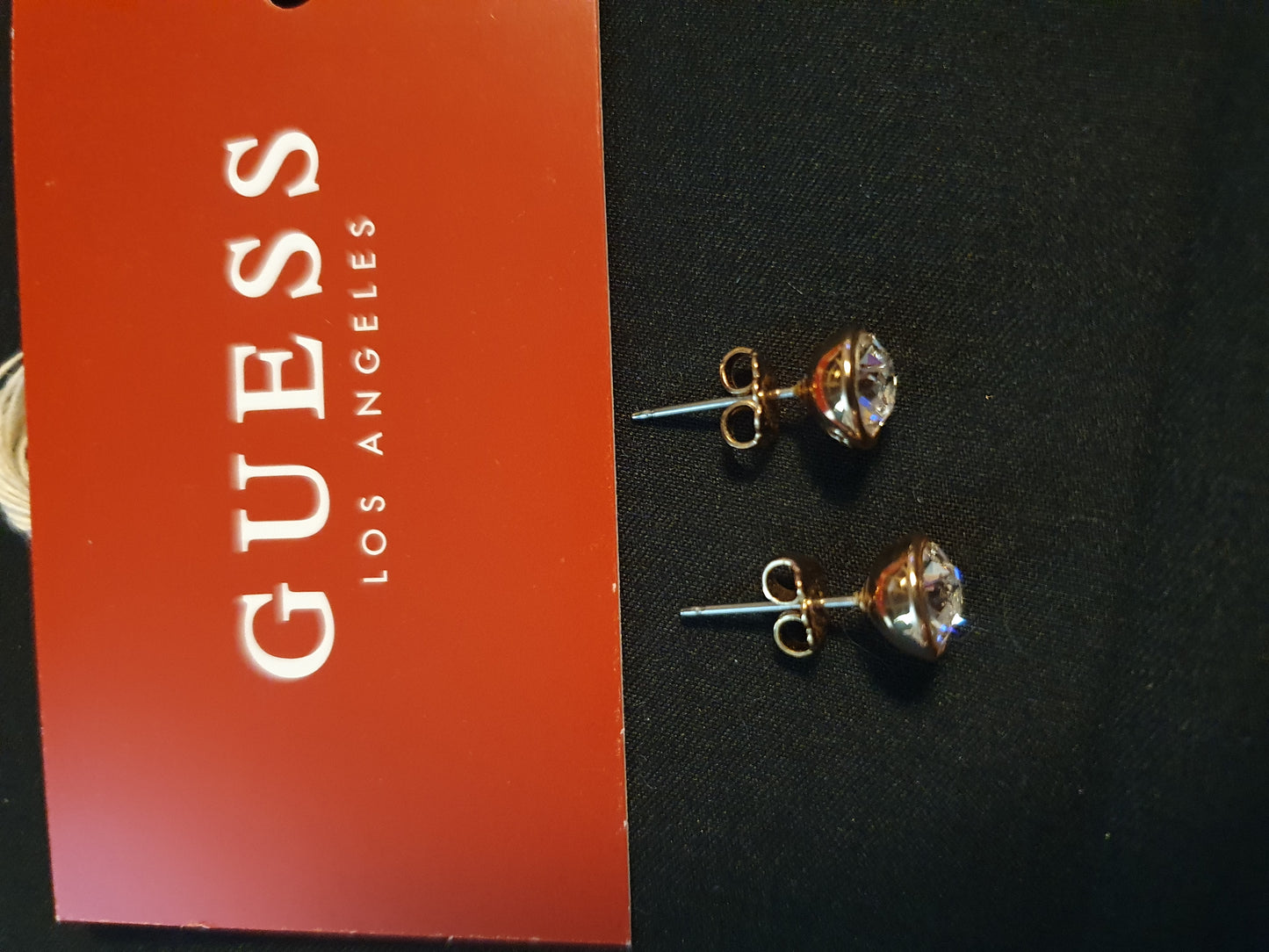 Orecchini Guess punto luce