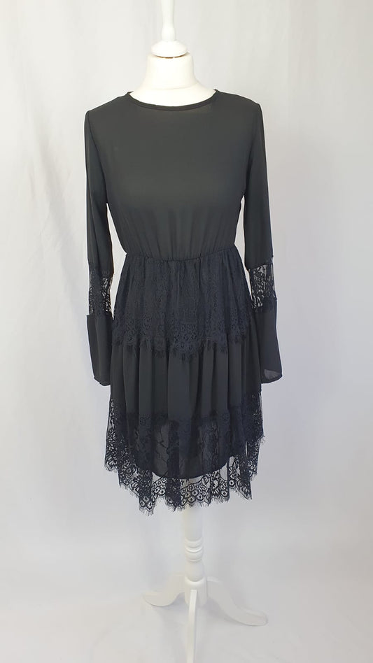 Vestito di pizzo Artigli